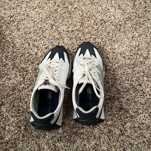 New Balance White and Navy Golf Shoes.  I used these for everyday instead.